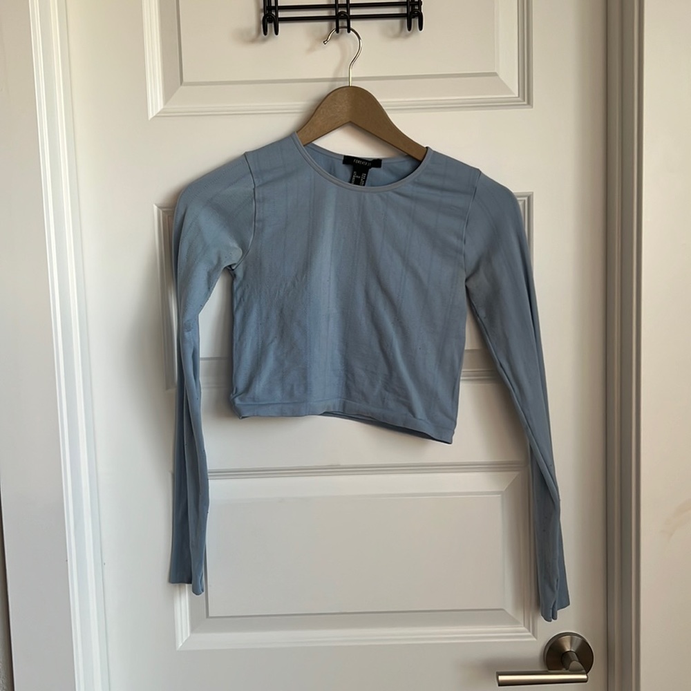 Small/medium, long sleeve, cropped blue shirt